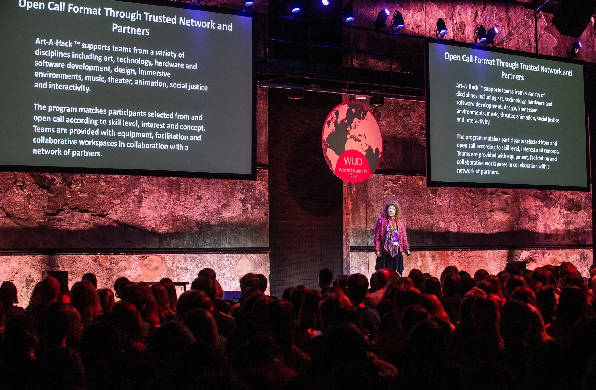 Ellen Pearlman speaking on a large stage