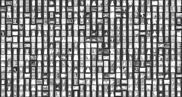 A grid with lots of tiny grayscale portrait images